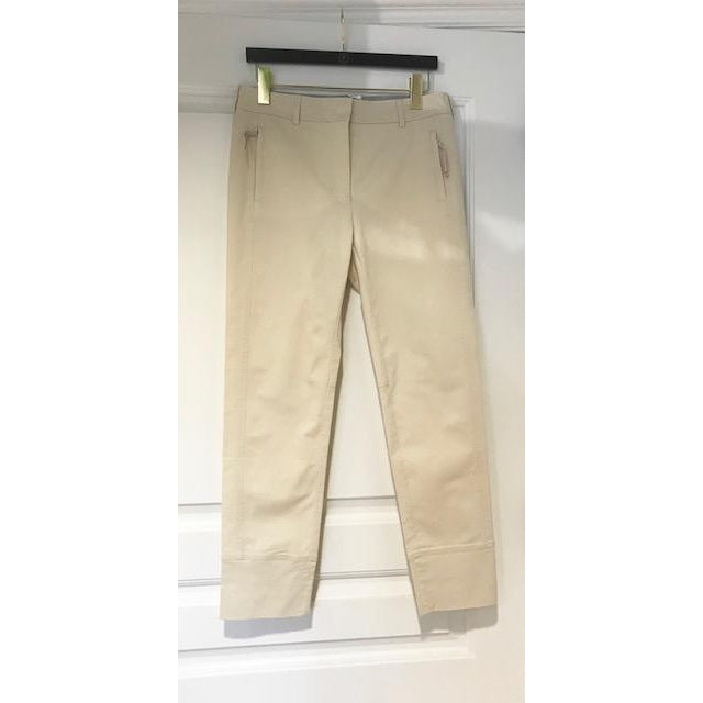 Tailored Pants with Zippered Pockets in White or Beige by Tonet - The Perfect Provenance
